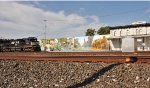 NS 7006 on H91 passing mural